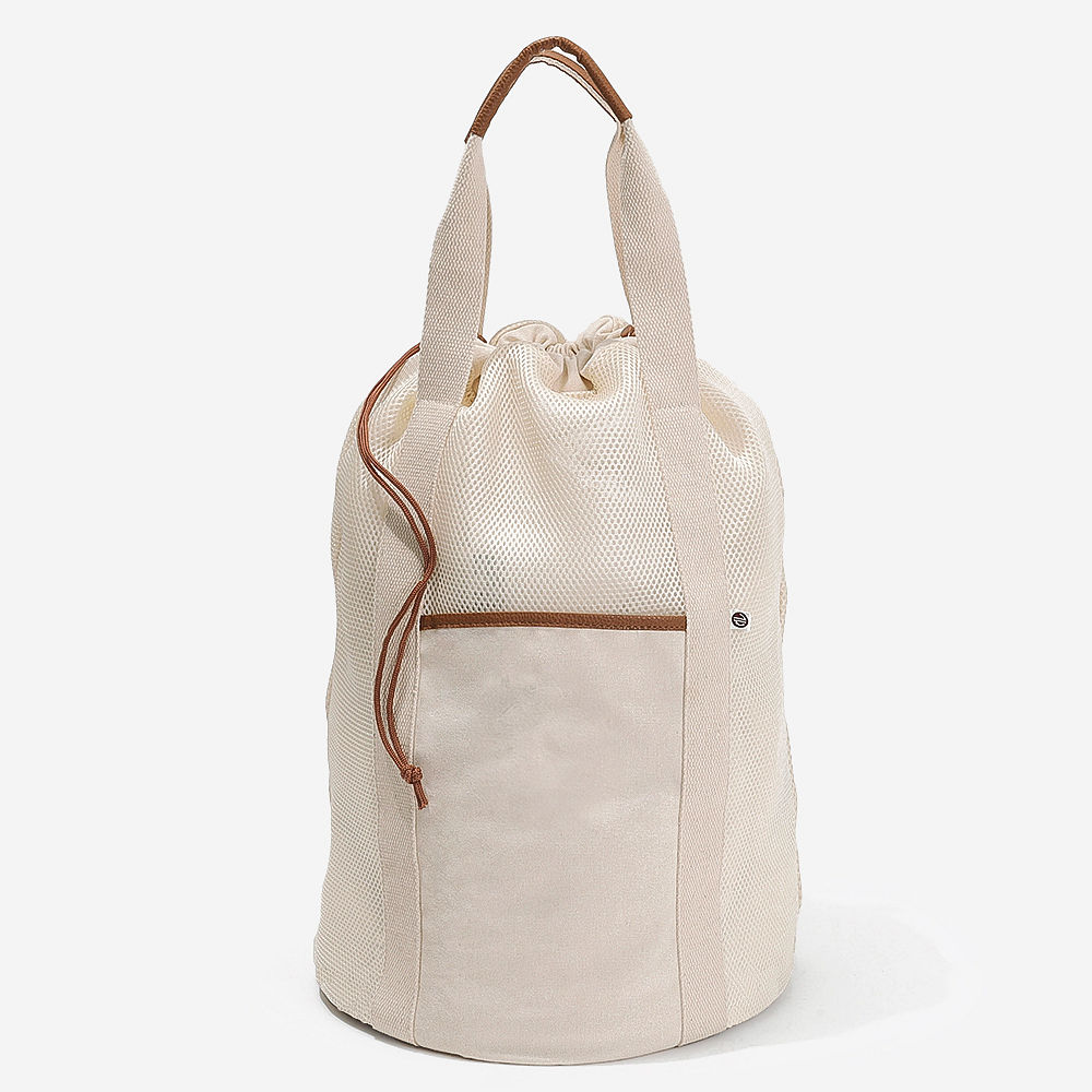 Ivory Packable Laundry Bag hanging around navy thread