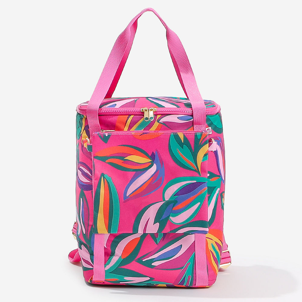 back of pink island sunset backpack cooler near pool