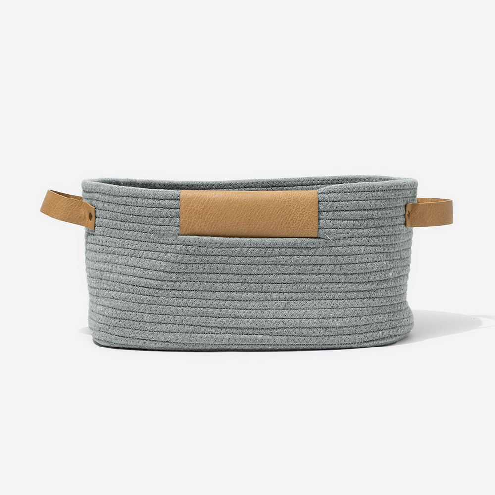 girl holding white personalized woven basket