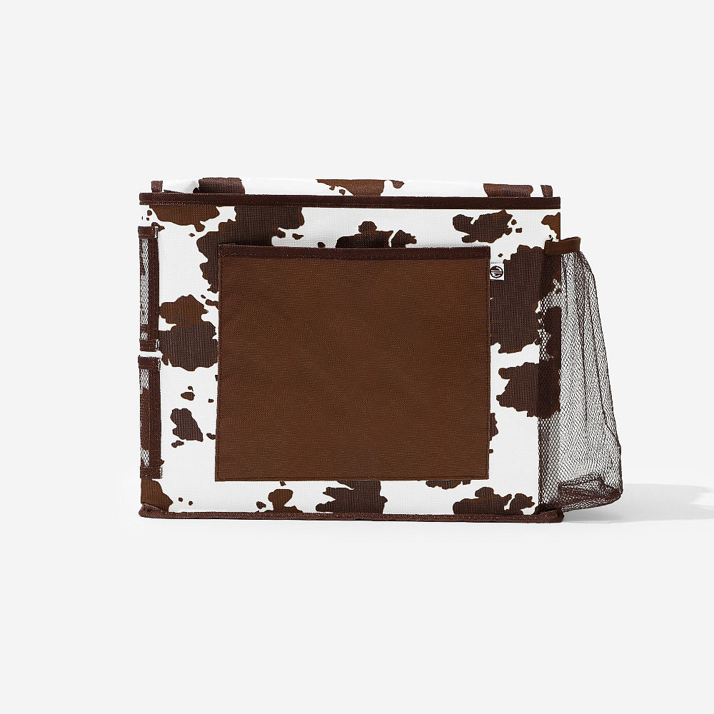 heathered grey bedside monogrammed caddy on bed