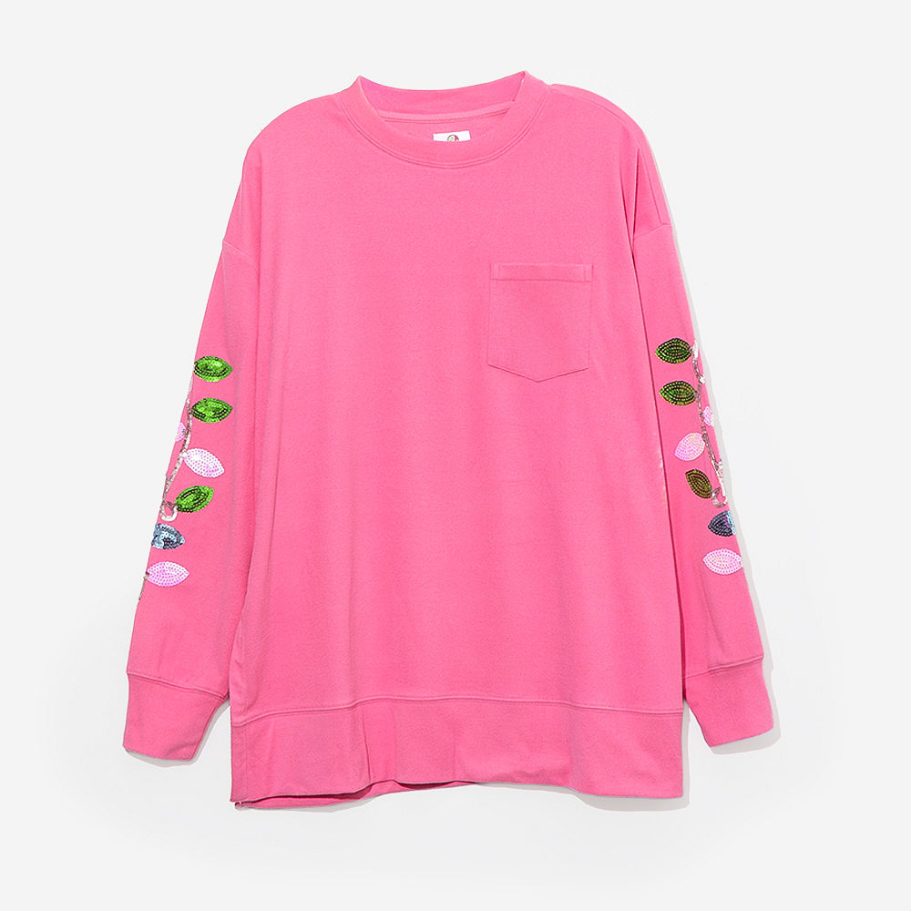 mom and me christmas sweaters in hot pink flatlay