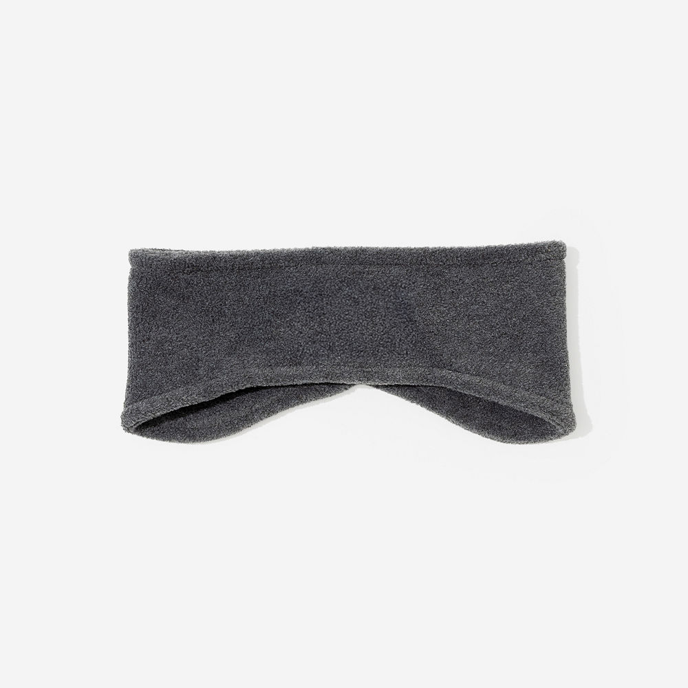 black ear band with gloves on green