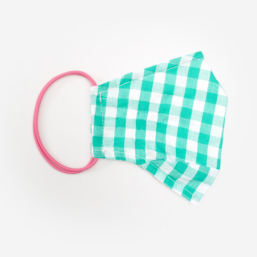 girl wearing monogrammed face mask