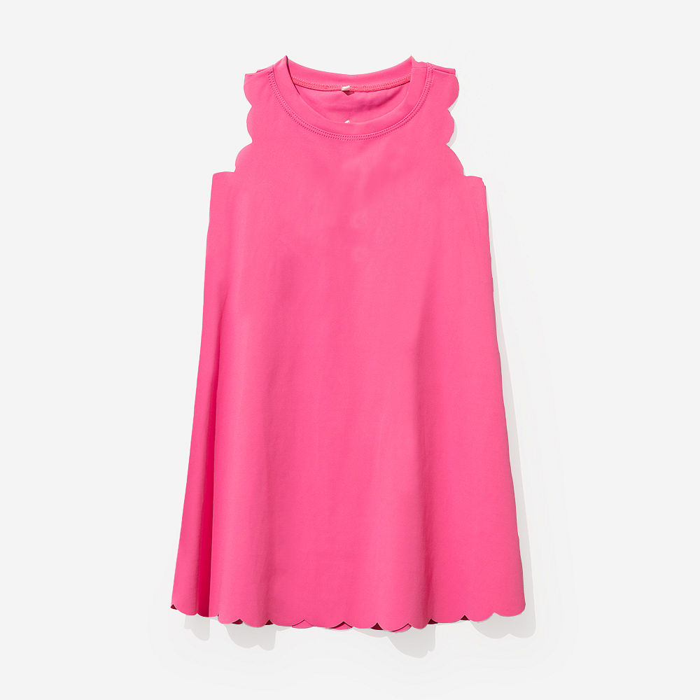 girl wearing kids scallop monogrammed lavender dress