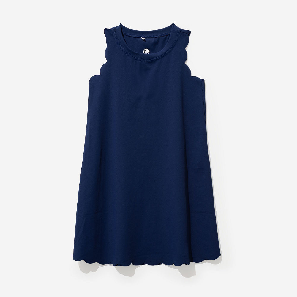 girl wearing kids scallop monogrammed lavender dress