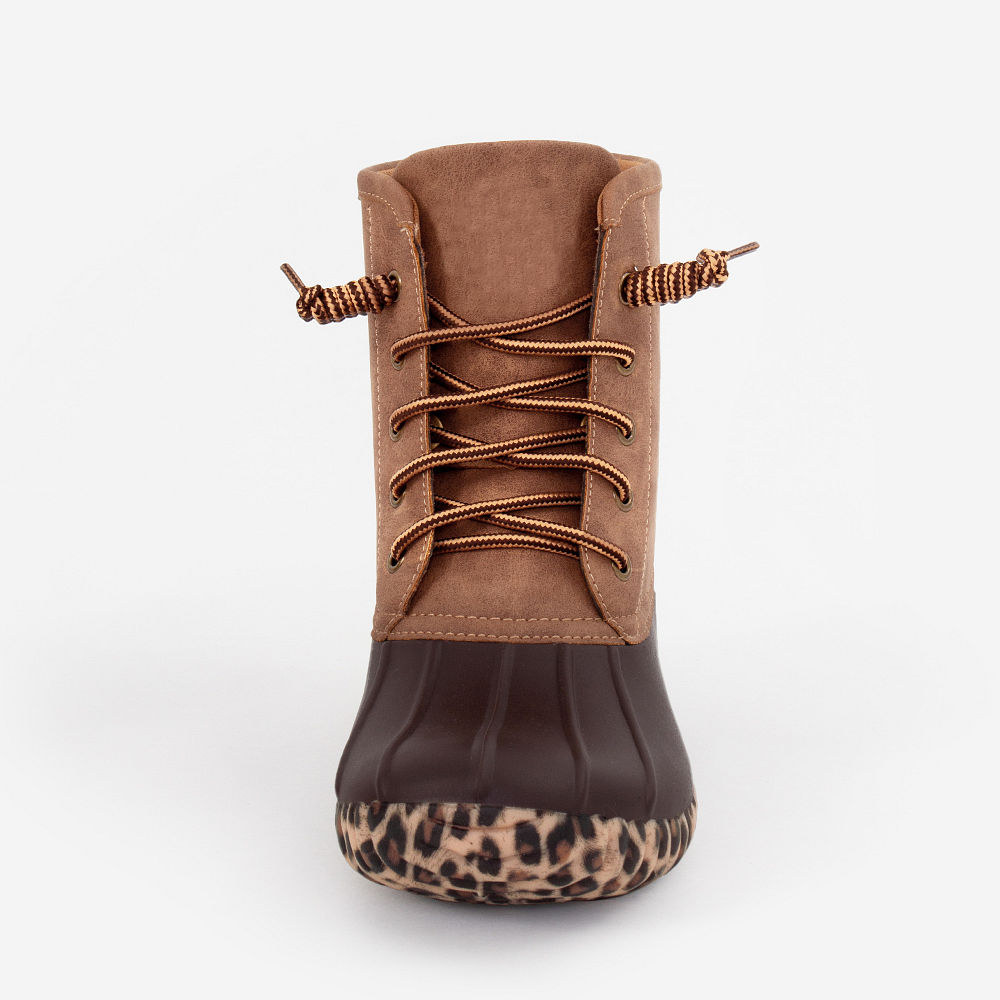 monogrammed leopard sole duck boots in car