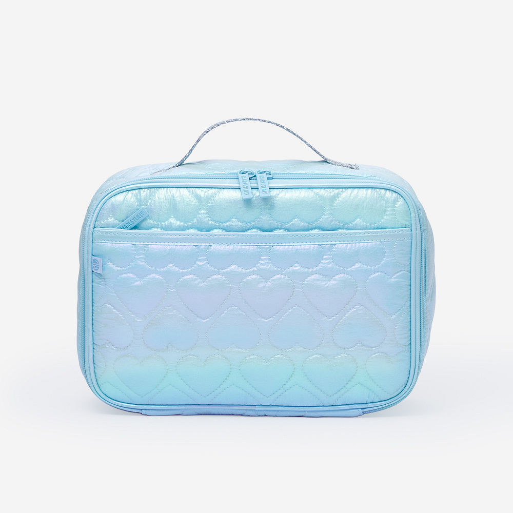 two girls carrying matching personalized backpacks and lunch boxes in mermaid magic and blue quilted hearts