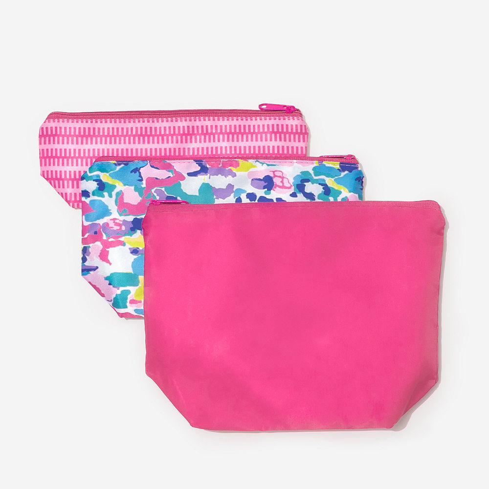 monogrammed packable cosmetic bag in Leopard with hair supplies