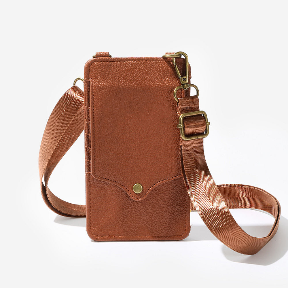 monogrammed phone crossbody in brown close up with chocolate thread