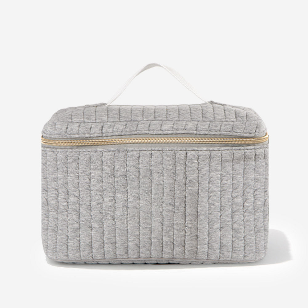 gray quilted train case and cosmetic case