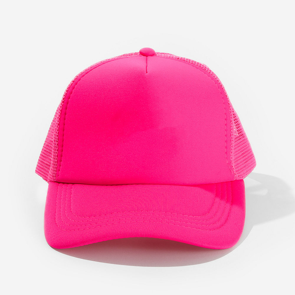 hot pink trucker hat on white rug