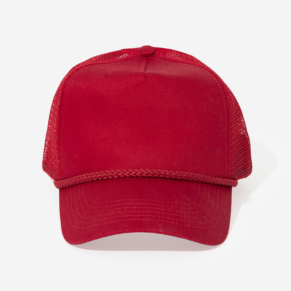 hot pink trucker hat on white rug