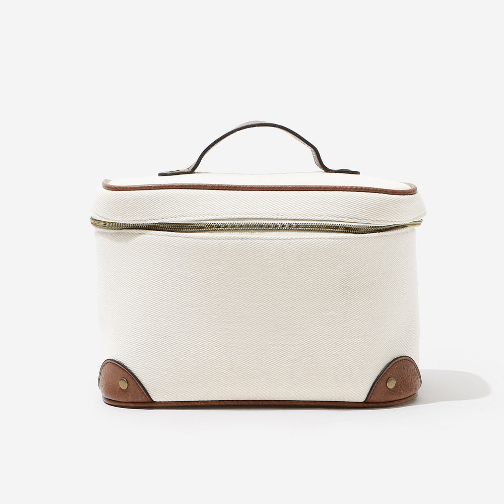 ivory (2024) vintage train case on bathroom counter