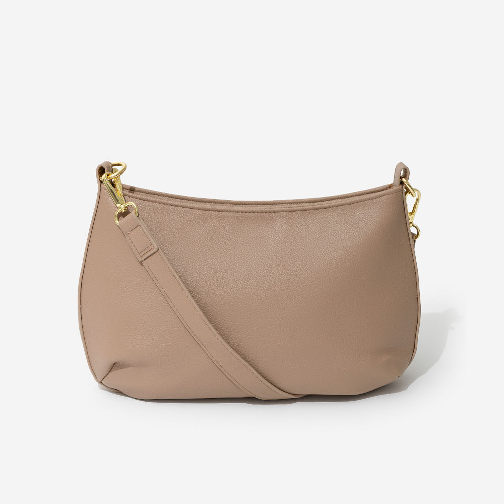 inside of tan shoulder bag