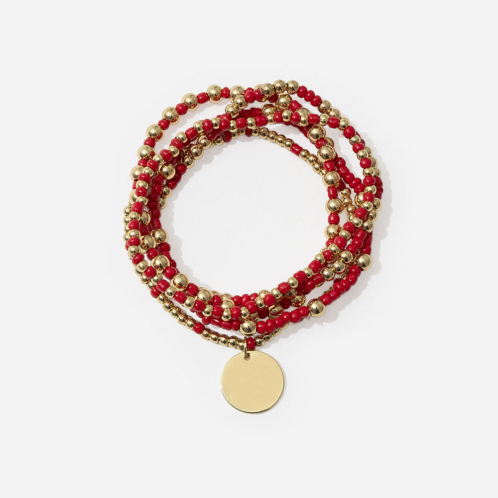 pearl gameday bracelet stack on sage background