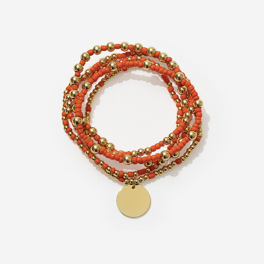 pearl gameday bracelet stack on sage background