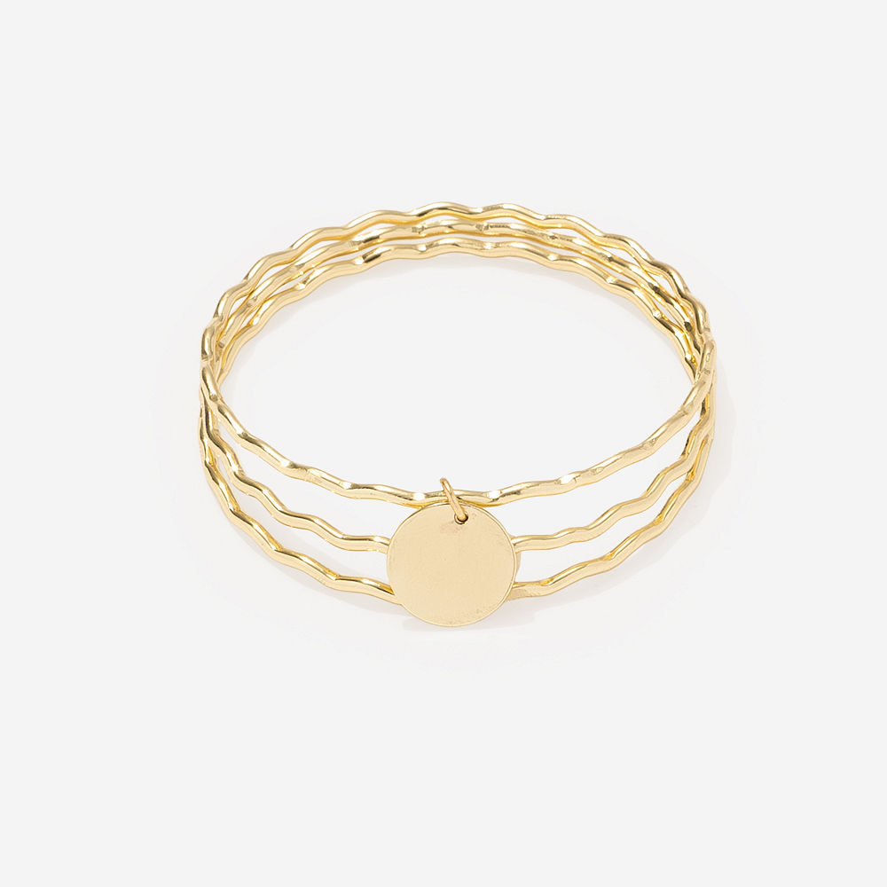 Gold Scalloped Bangle Set on green