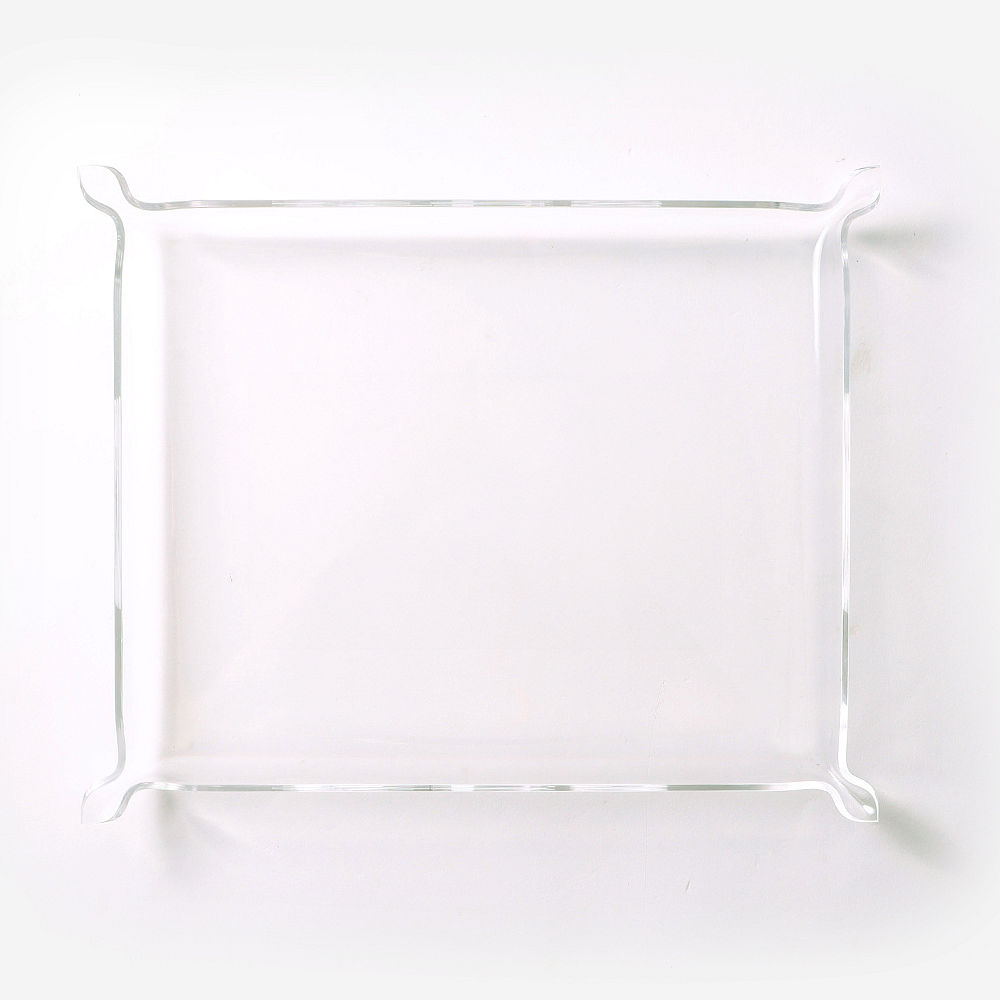 monogrammed acrylic tray on marble counter