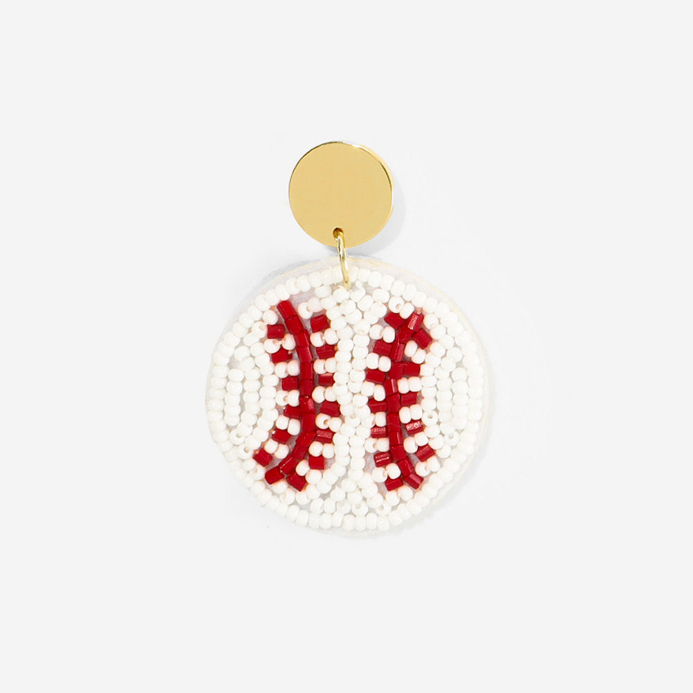 baseball earrings on white marble