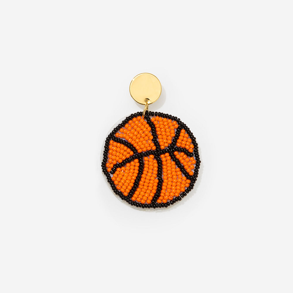 basketball personalized earrings in hands