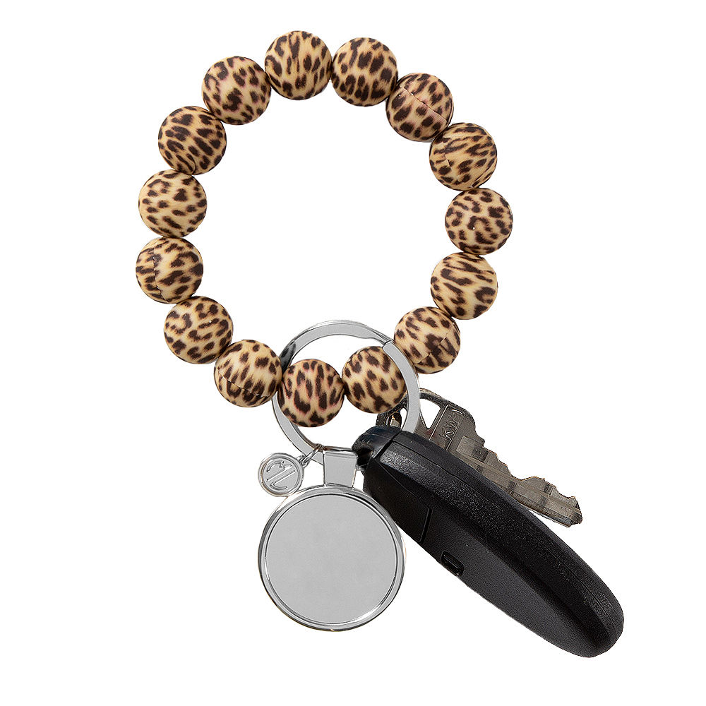 leopard bracelet key ring in jungle background