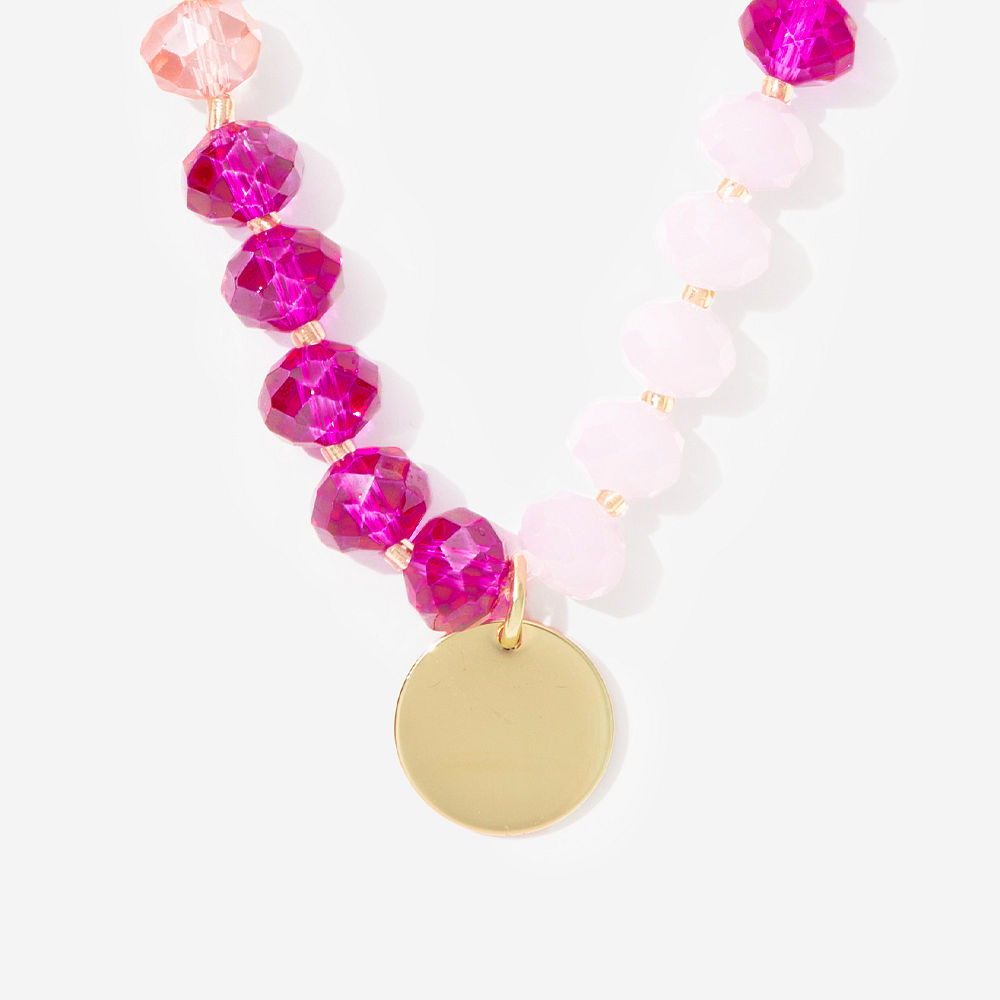 blue beaded necklace with white button down