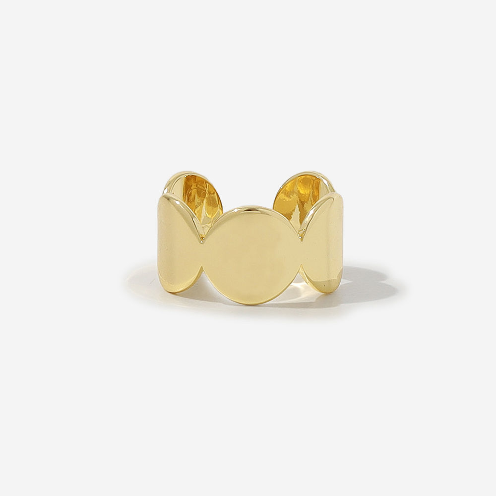 girl wearing gold cuff ring