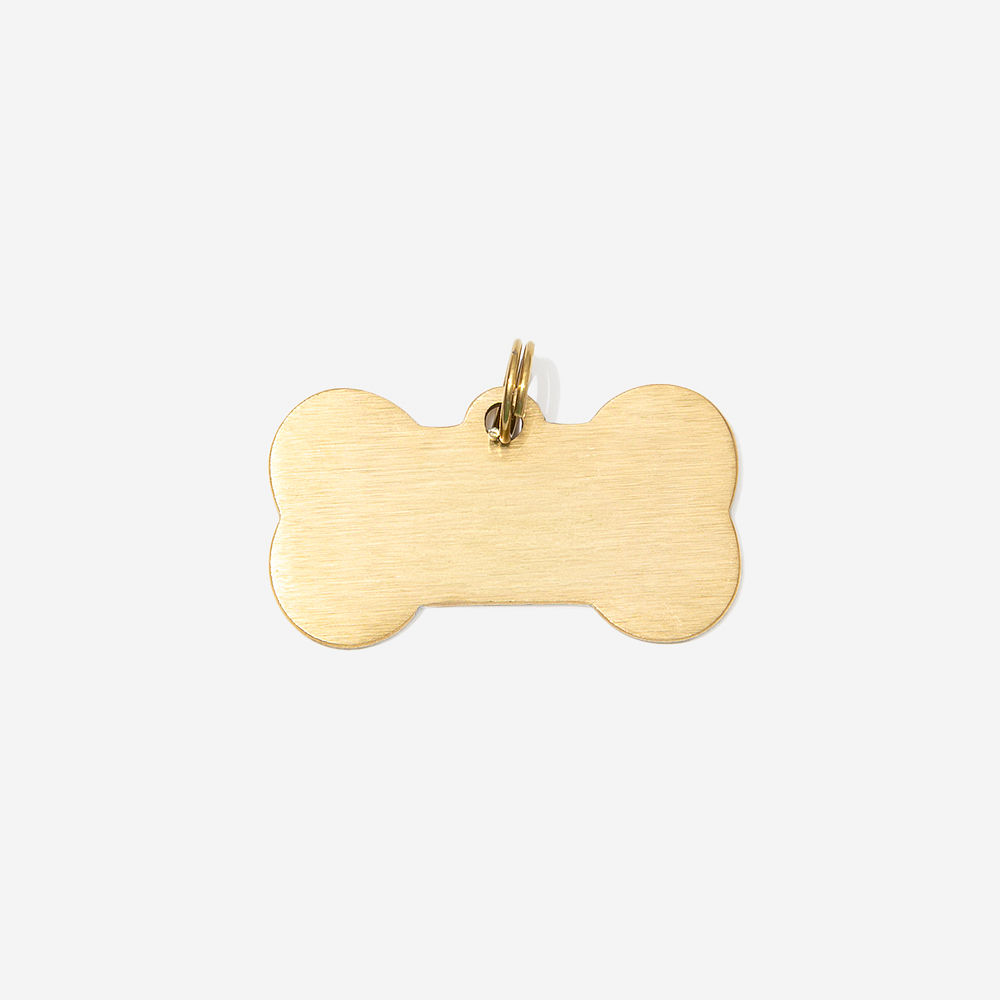silver dog tag with navy dog bandana