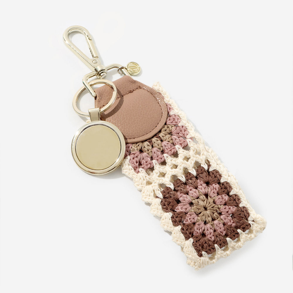 spring leopard key fob in grass