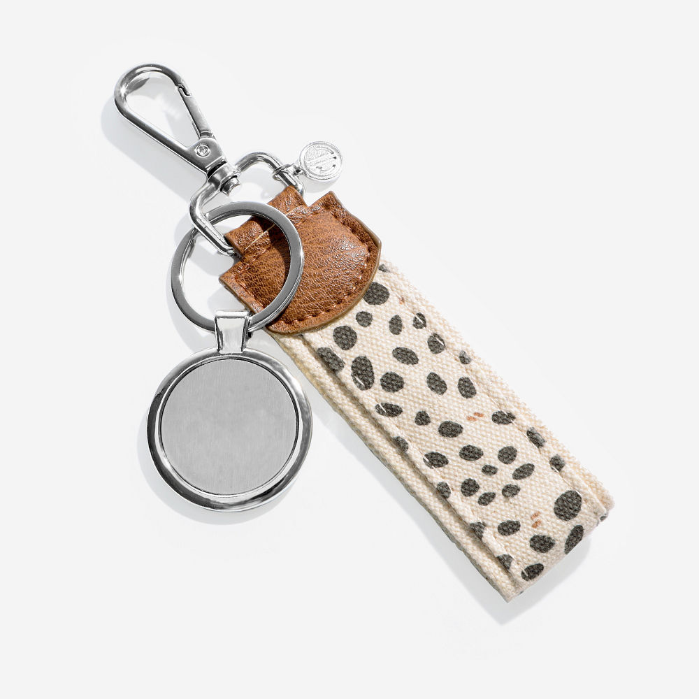 spring leopard key fob in grass