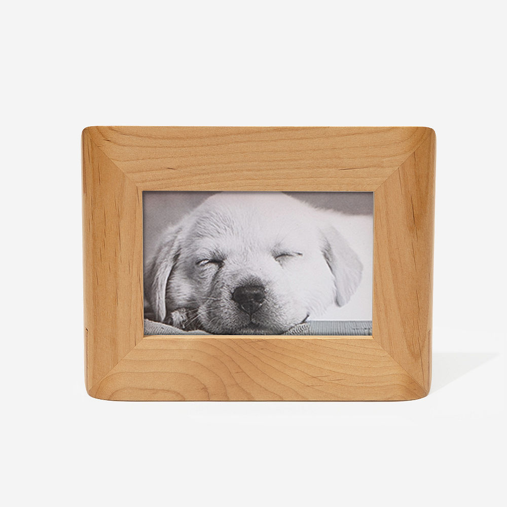 two personalized pet photo frames on pink