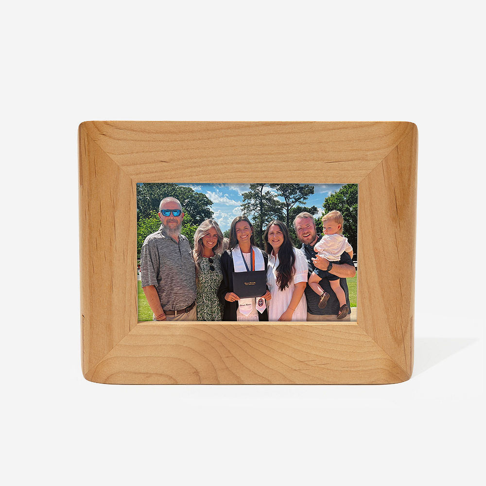 two personalized photo frames on pink