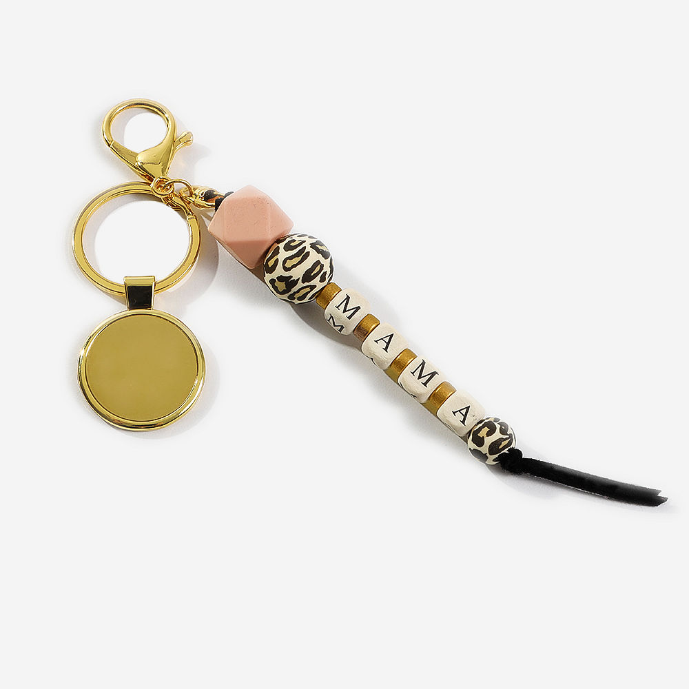 personalized leopard mama keychain on purse