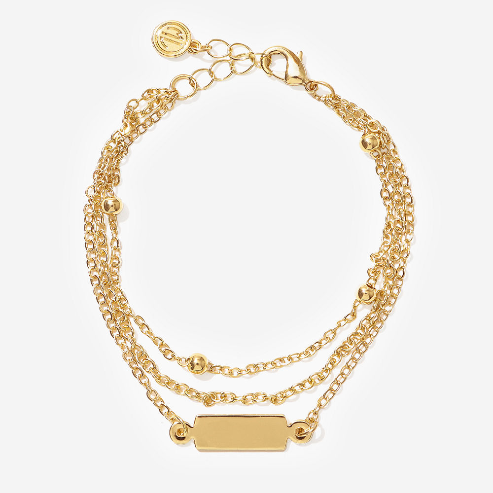 monogrammed silver multistrand bracelet on wrist