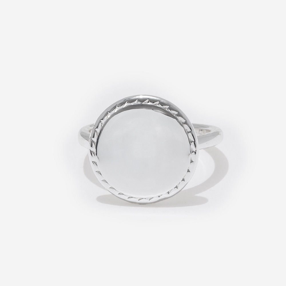 silver nala ring on pink background