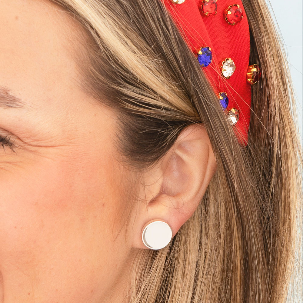 silver patriotic earring set on marble dish