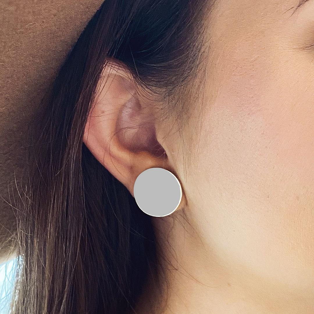 silver personalized oversized earrings in ear