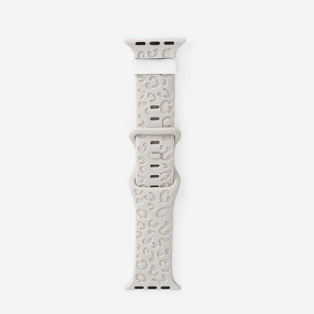 light gray smart watch band on wrist with pink background