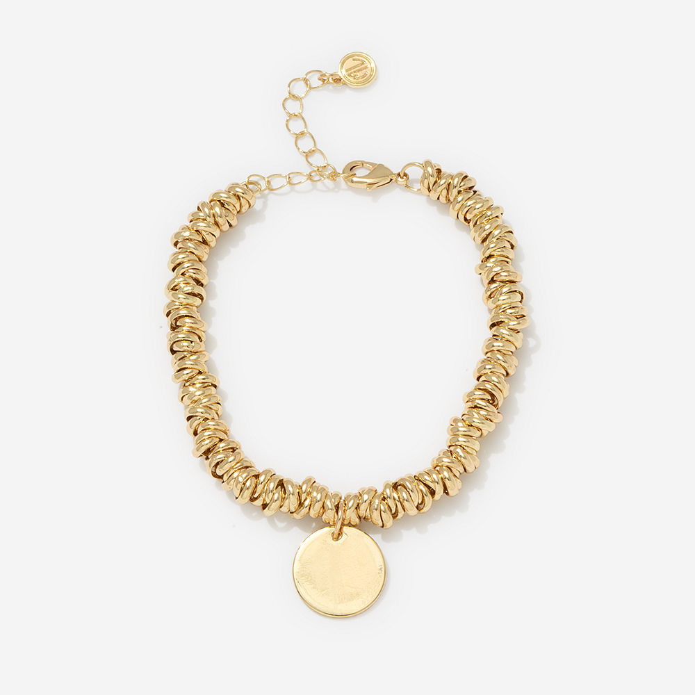 gold twisted knot bracelet with mug