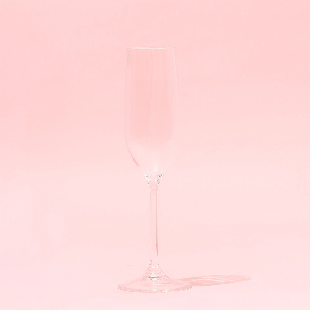 Personalized acrylic champagne glass on table wedding