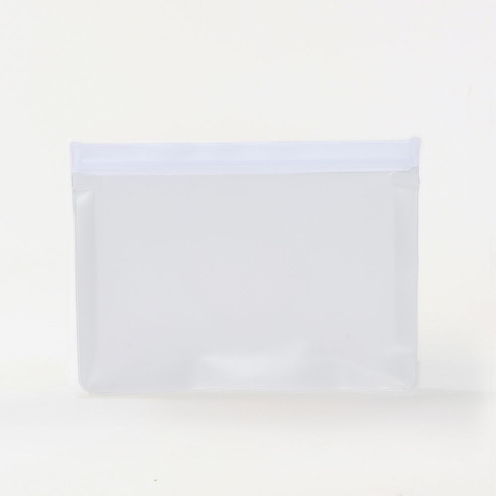 pink airtight dry bag with school supplies