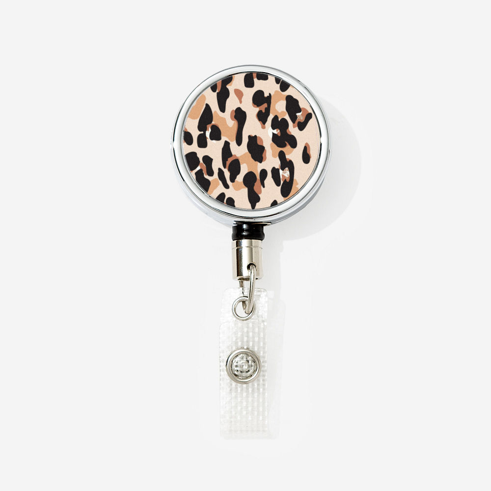 classic cheetah personalized badge reel on desk