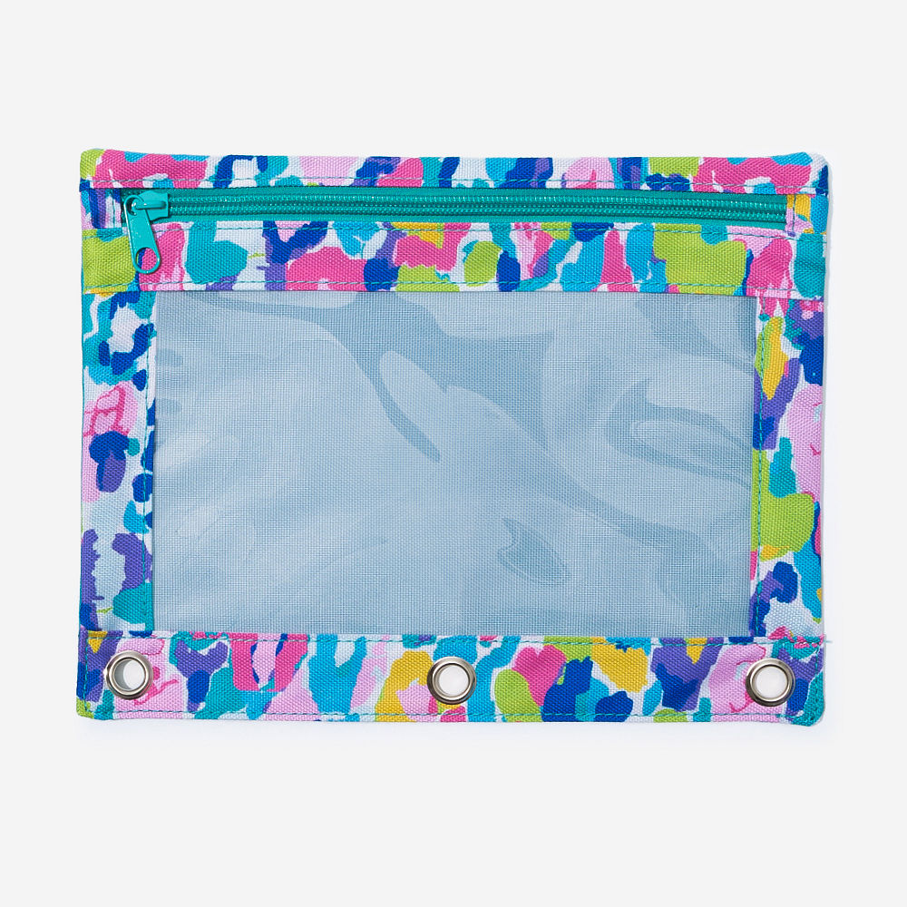 coral floral monogrammed backpack lunch box and binder pouch on students desk in classroom