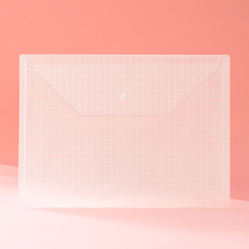 kids artwork in monogrammed file document holder