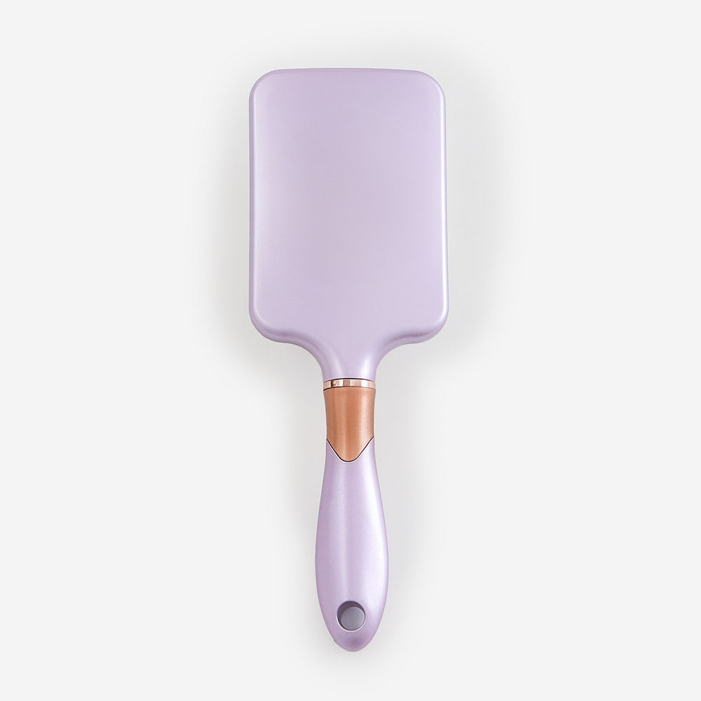 lavender hairbrush in hair