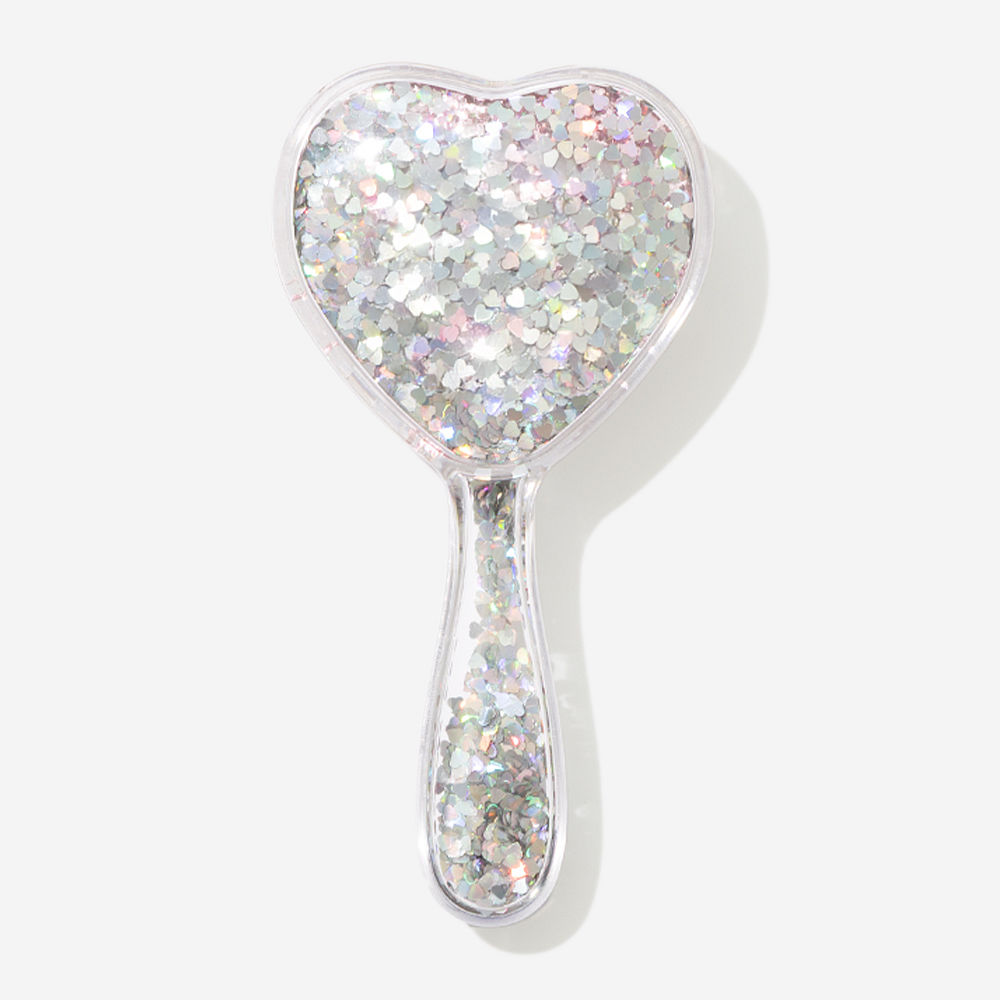 pink purse brush on brown background