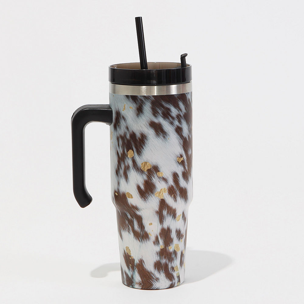 https://images.marleylilly.com/catalog/previewer/6/travel-tumbler-in-cowhide-30oz.jpg