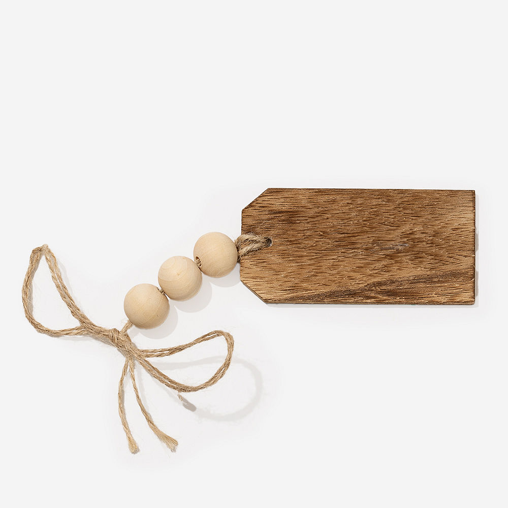 wooden personalized tag on christmas gift