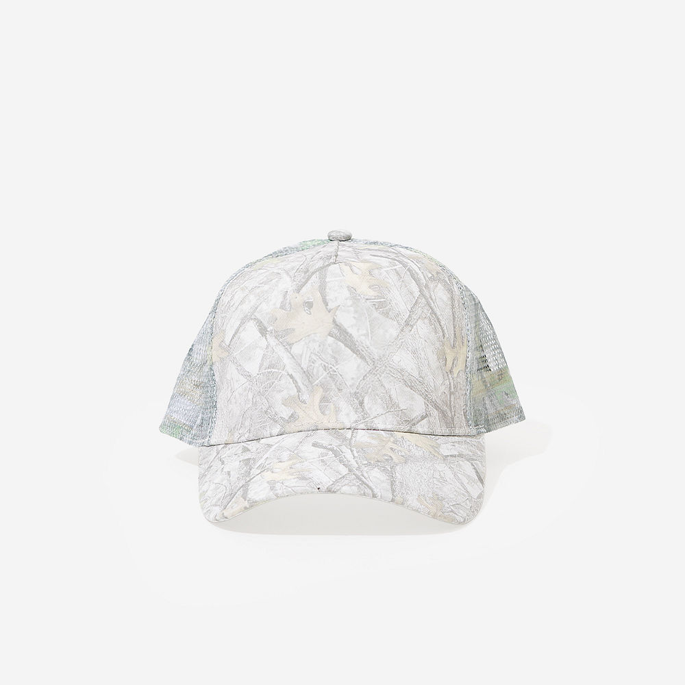 girl wearing camo trucker hat with vest