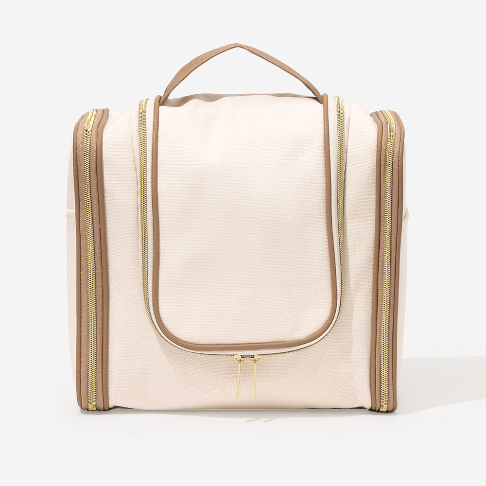 ivory monogrammed hanging toiletry and cosmetic and weekender bags